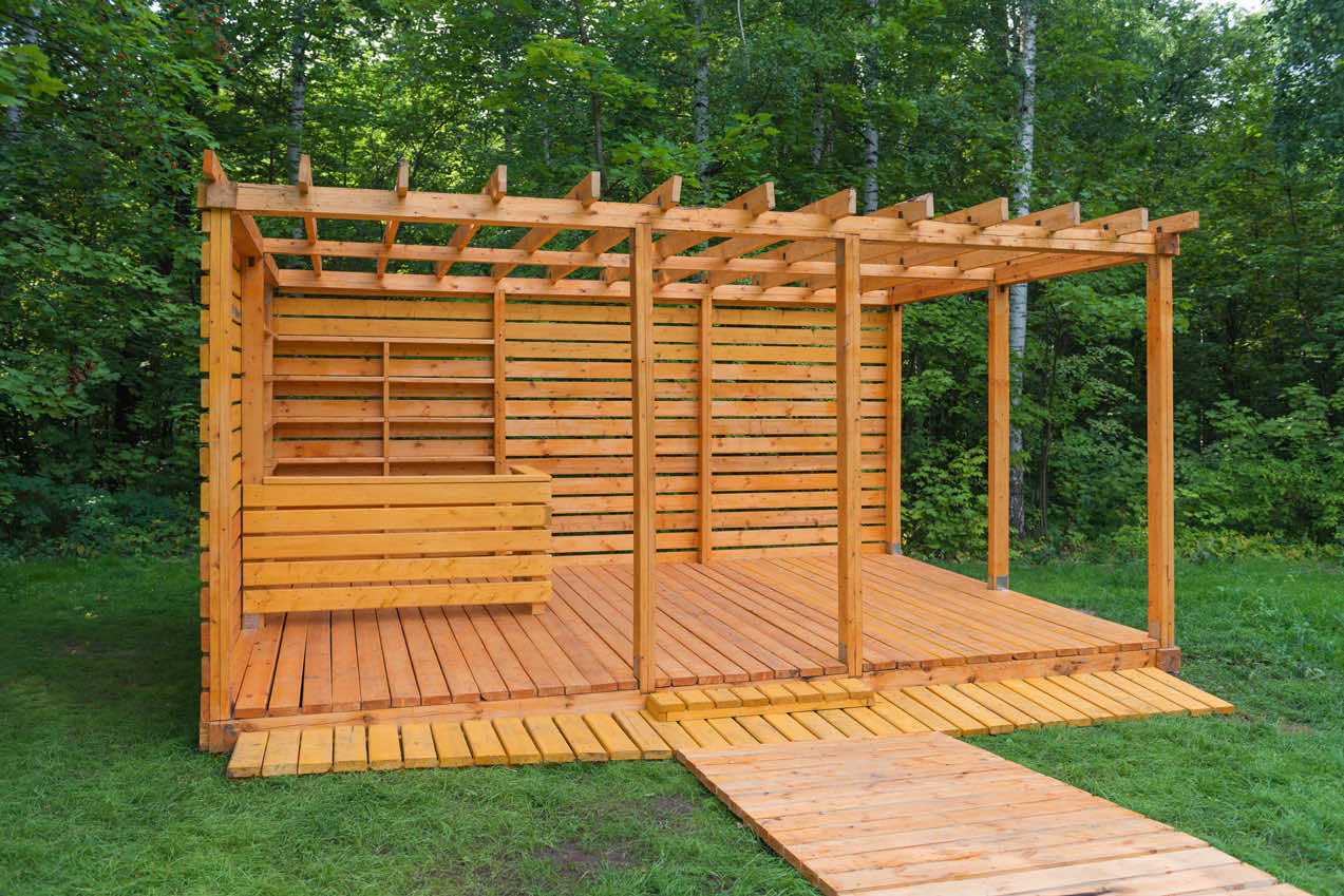 Pergolas with a built out section for hottub